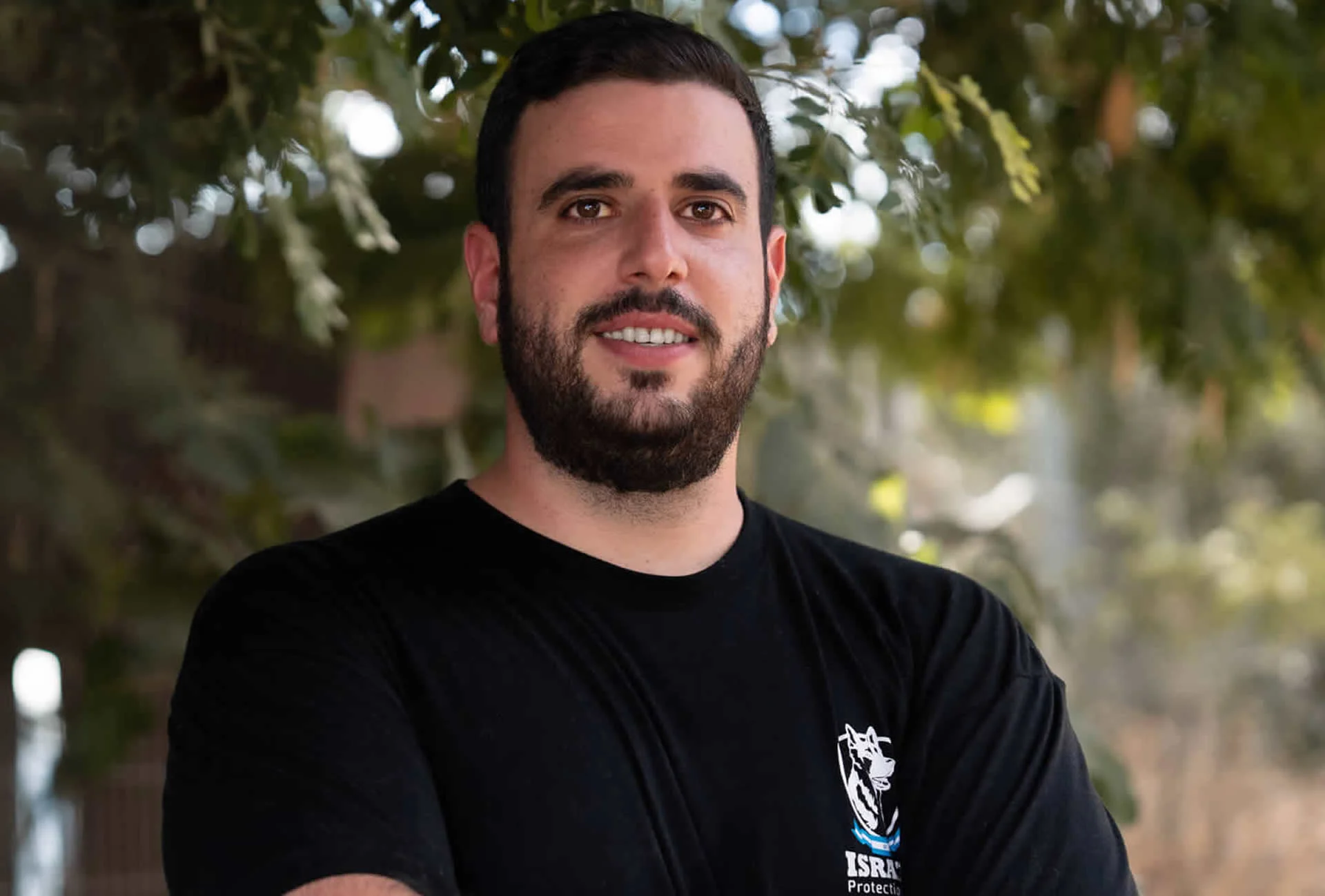 Erez Dodi, Israel Protection K9 trainer, portrait of a skilled canine expert.